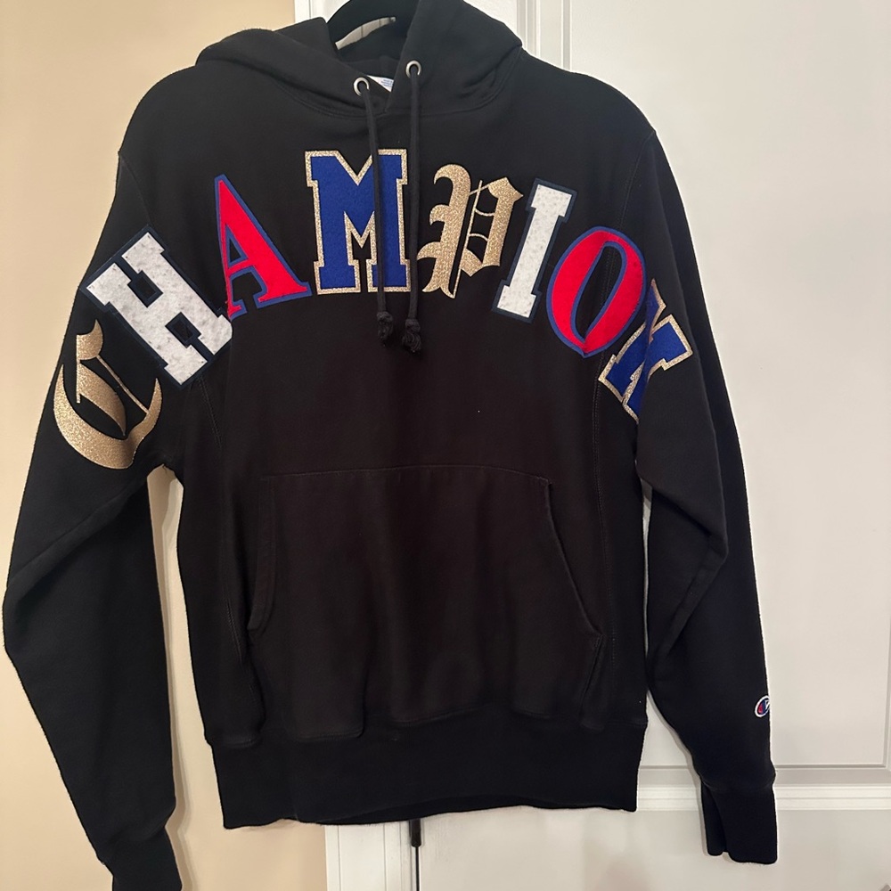 Champion Black Hoodie with Red, Blue, and Gold Lettering